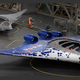 A rendering showing the potential redesign of aircrafts with the new tech, assembled by the orange robots.